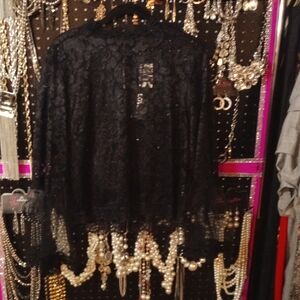 A 1X Black Lace Blouse With A Zipper In The Back